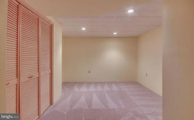 an empty room with a natural light