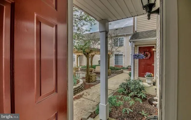 a front view of a house with a porch