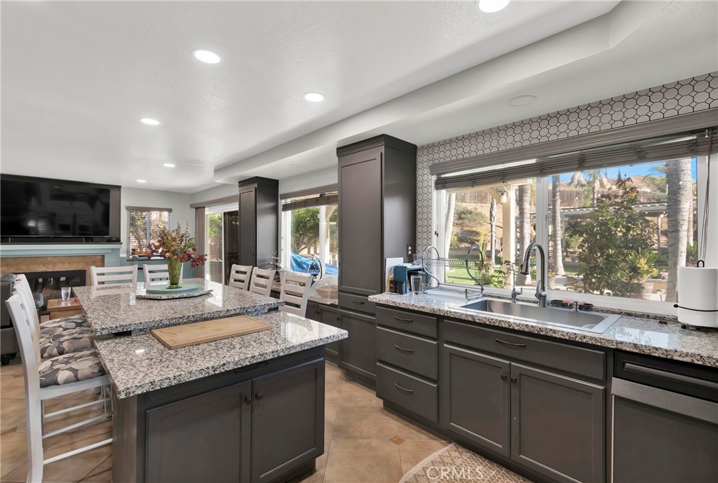 3350 May Court Riverside, CA 92503 - Photo 38 of 55 a kitchen with center island and sink