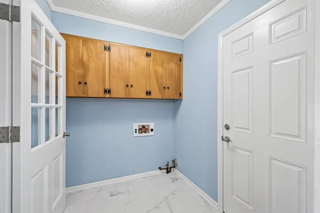 a view of cabinets and wooden floor