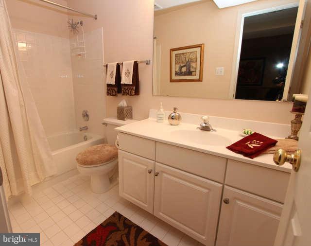 1330 Wedgewood Manor Way Reston, VA 20194 - Photo 23 of 30 a bathroom with a sink toilet and shower