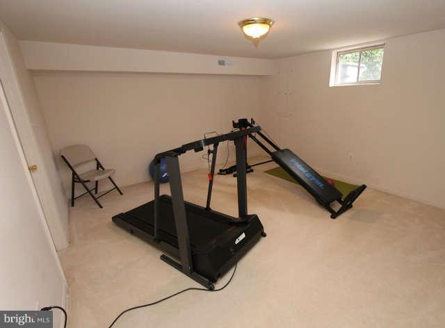 1330 Wedgewood Manor Way Reston, VA 20194 - Photo 24 of 30 a room with gym equipment