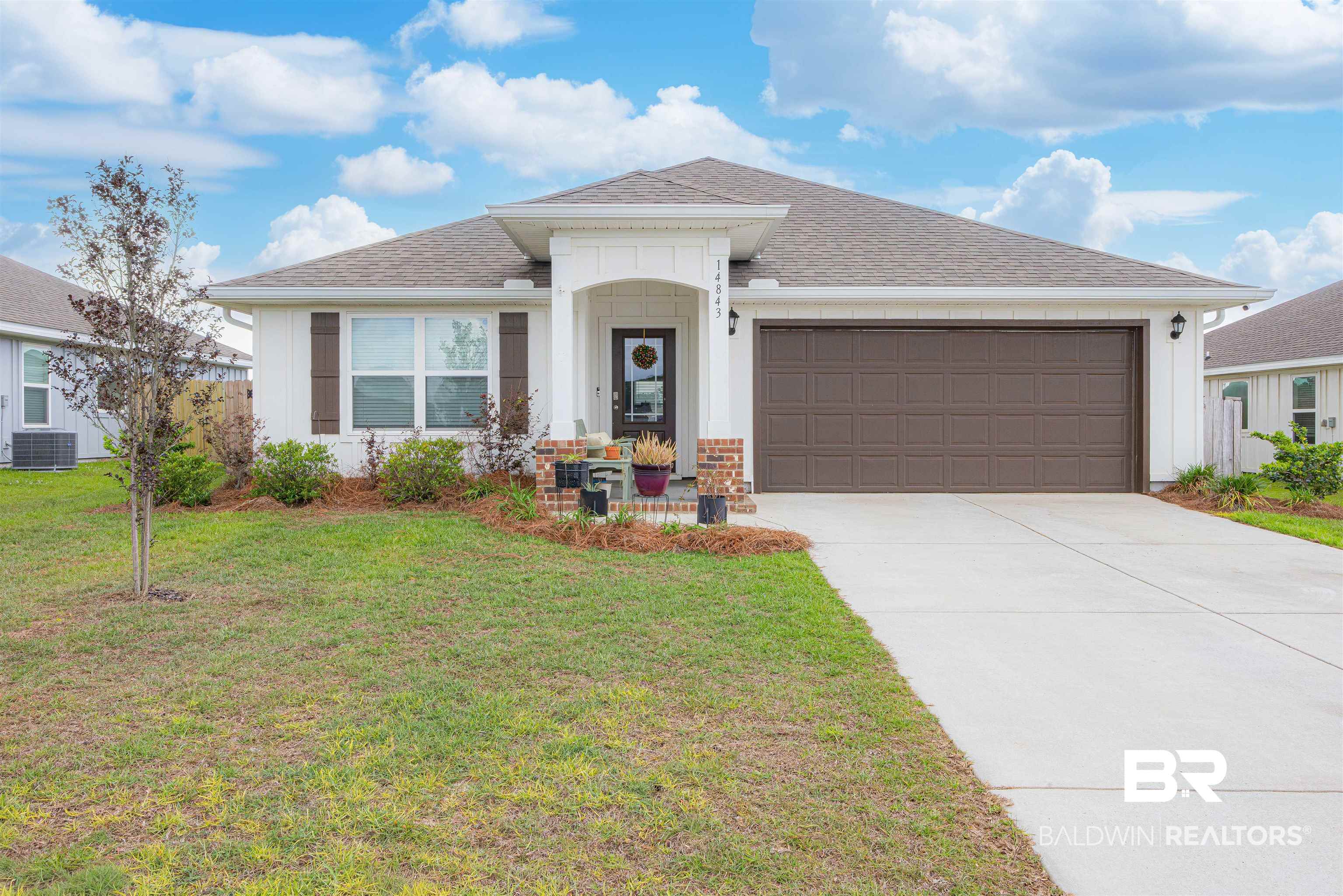 14843 Forsythia Loop Silverhill, AL 36576 - Photo 1 of 51 Ranch-style home featuring roof with shingles, an attached garage, a front yard, and driveway