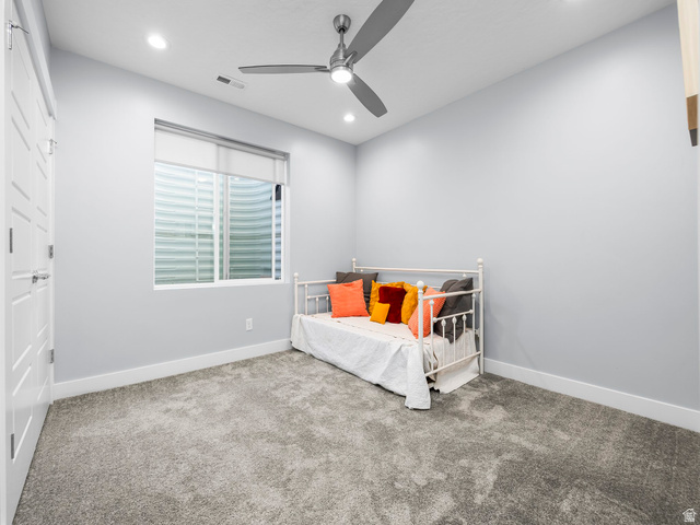 877 South Yarrow Drive Mapleton, UT 84664 - Photo 16 of 46 Room featuring plush grey carpeting, light grey walls, and recessed lighting
