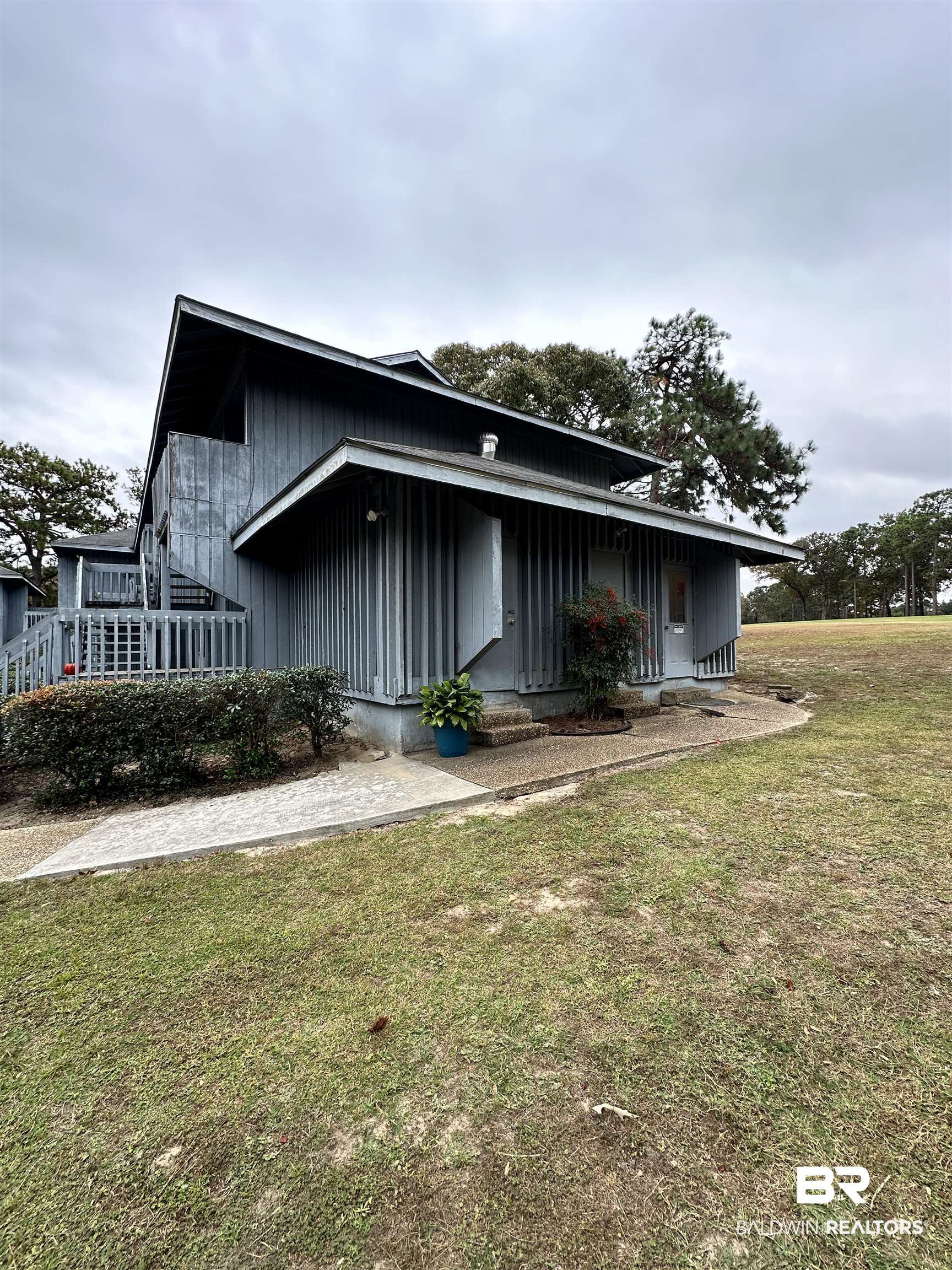 123 Golf Terrace, Unit 1F123 Daphne, AL 36526 - Photo 22 of 23 Laundry just steps away
