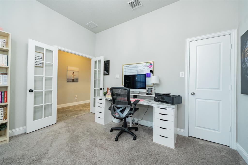 593 Spruce Trail Forney, TX 75126 - Photo 17 of 40 Home office with french doors and light carpet