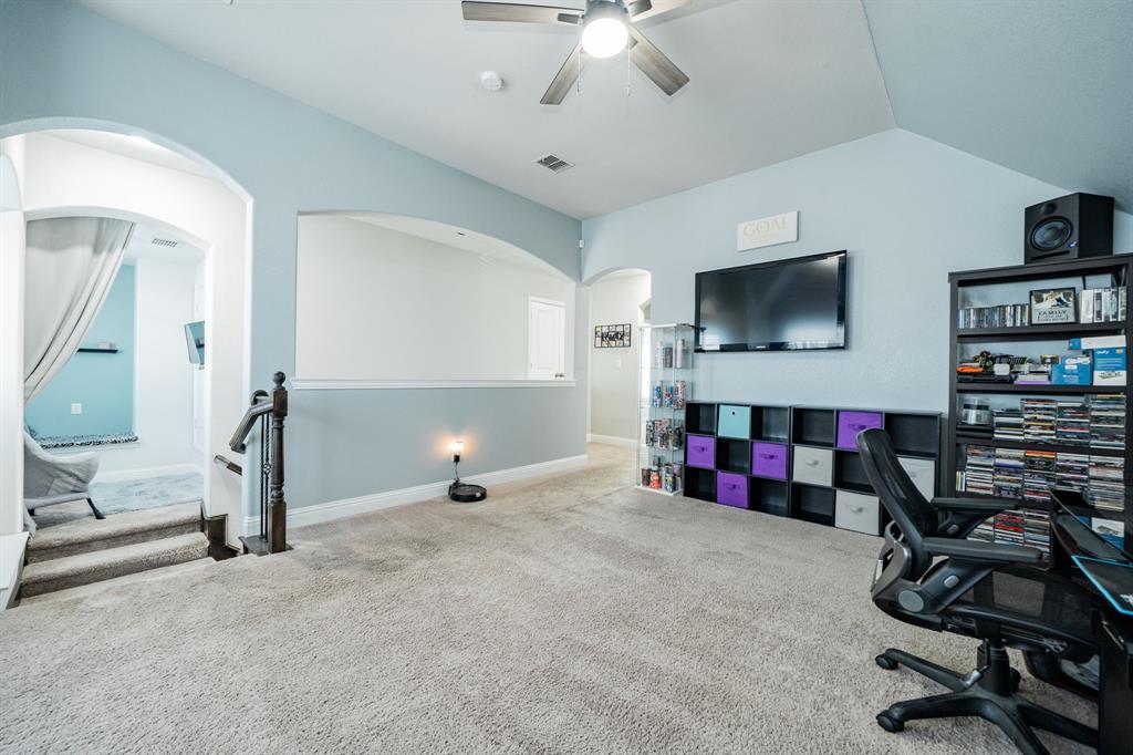 593 Spruce Trail Forney, TX 75126 - Photo 30 of 40 Office with arched walkways, carpet, and a ceiling fan