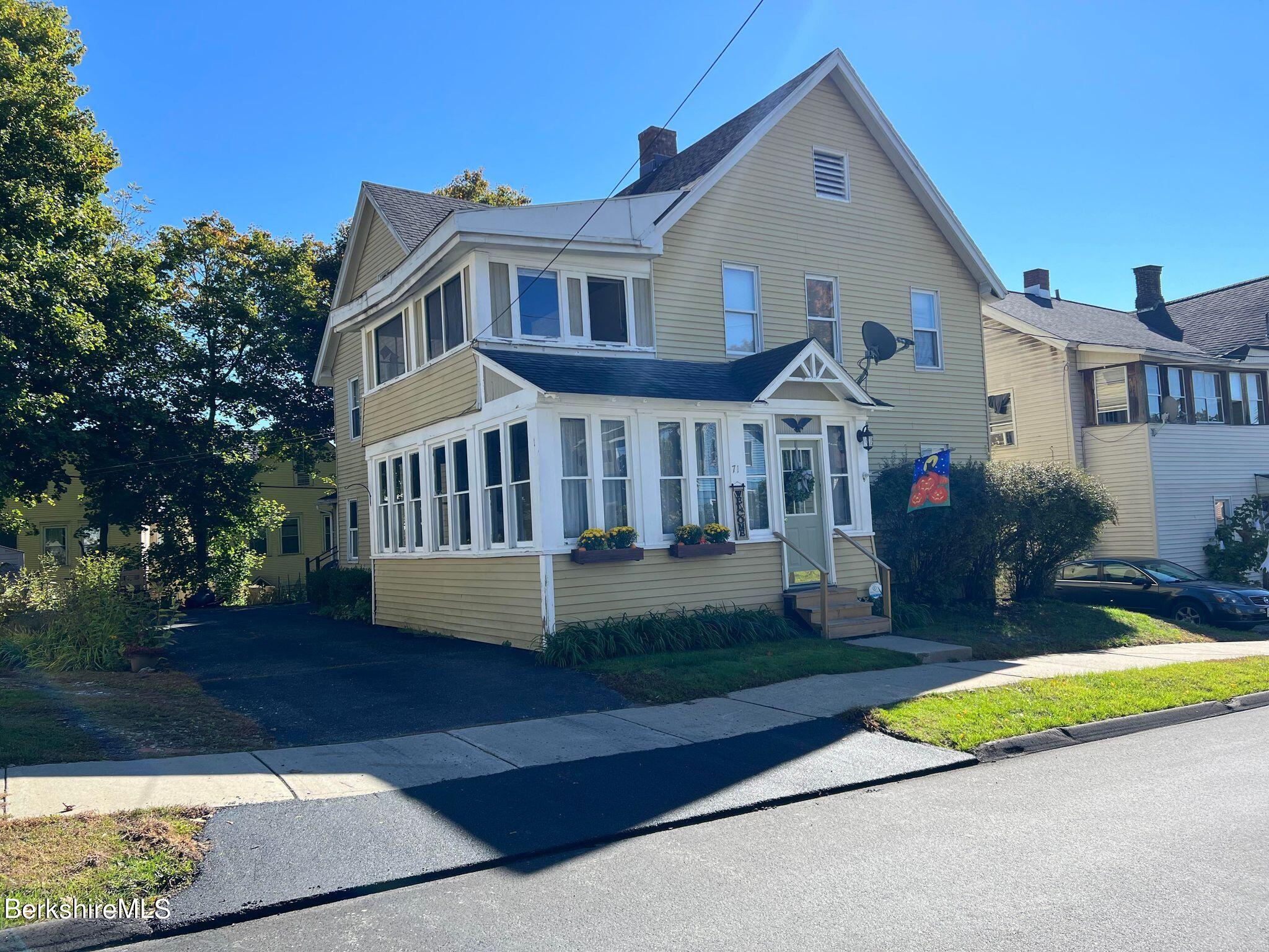 71 Howard Street Pittsfield, MA 01201 - Photo 1 of 42 a front view of house with yard and green space