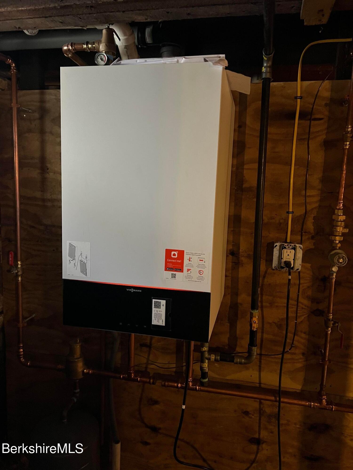 71 Howard Street Pittsfield, MA 01201 - Photo 37 of 42 a utility room with multiple dryer and washer