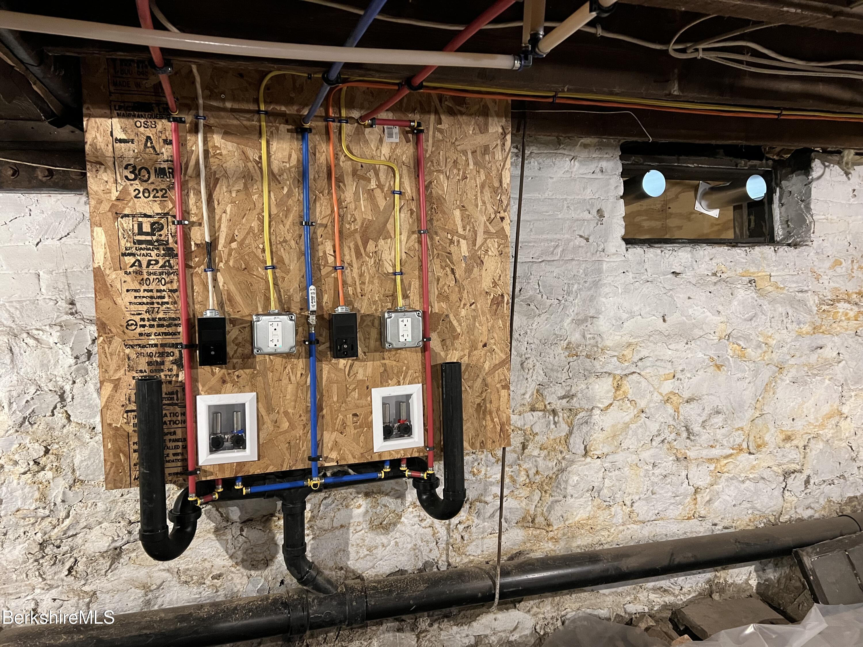 71 Howard Street Pittsfield, MA 01201 - Photo 39 of 42 a bathroom with a granite countertop sink and a mirror