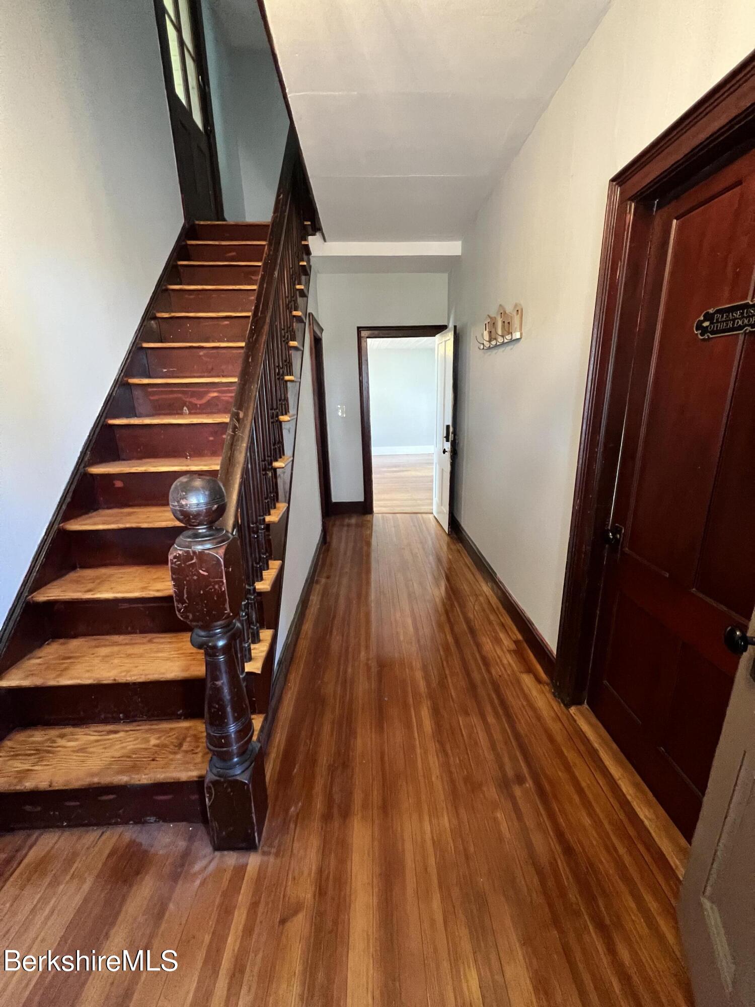 71 Howard Street Pittsfield, MA 01201 - Photo 7 of 42 a view of entryway with wooden floor