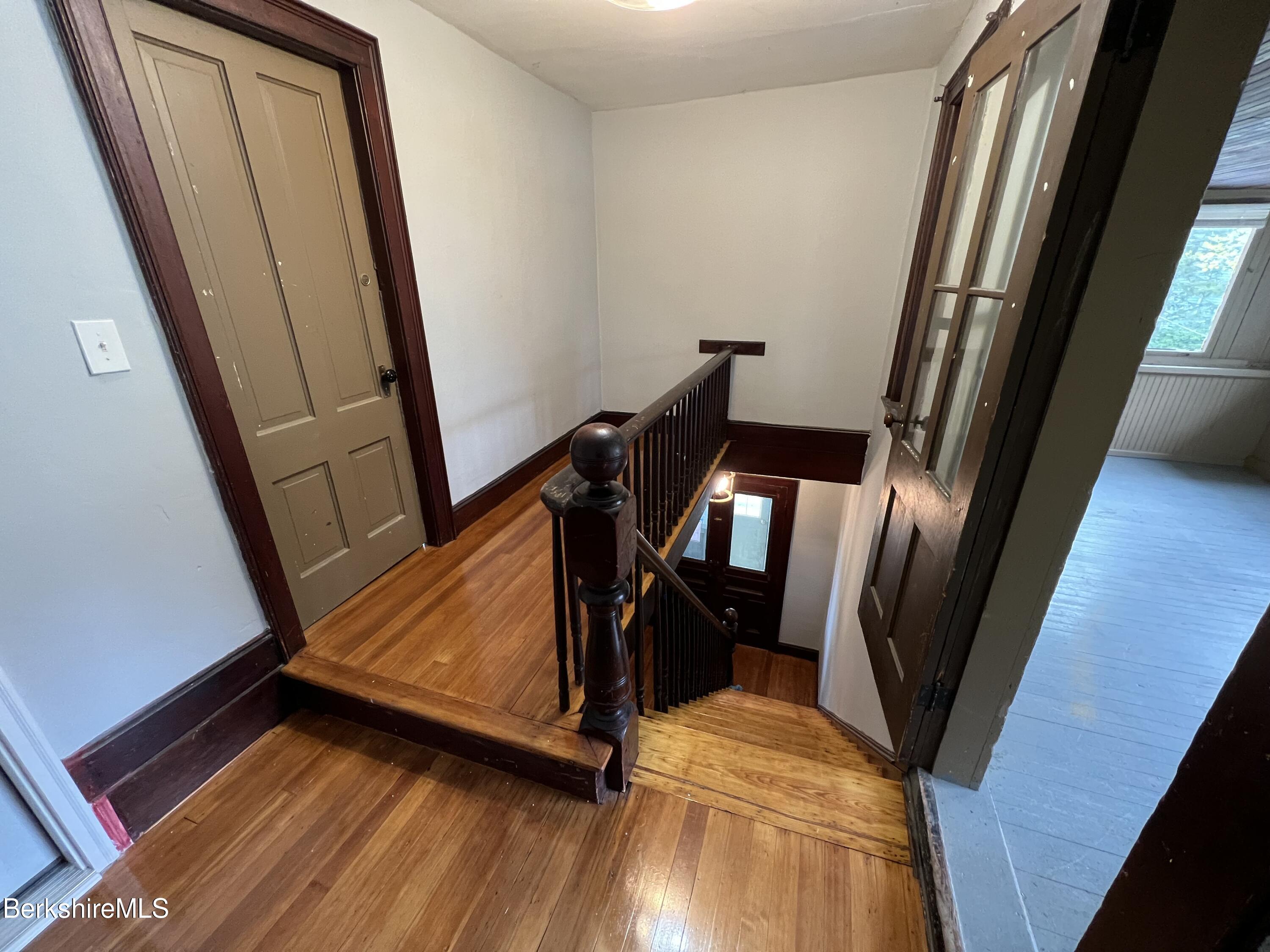 71 Howard Street Pittsfield, MA 01201 - Photo 9 of 42 a view of an entryway with wooden floor