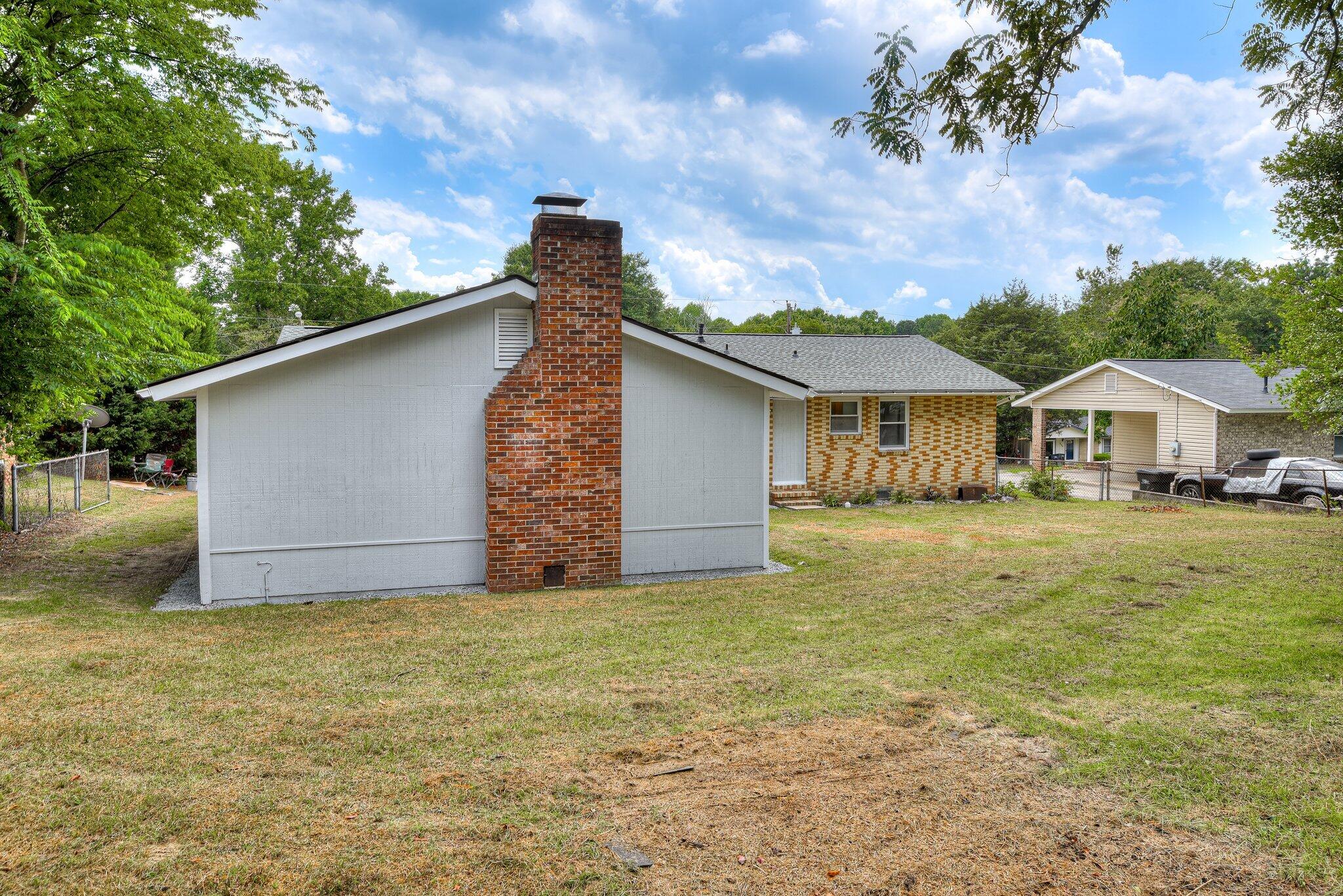 2115 Ashley Drive Augusta, GA 30906 - Photo 36 of 38 a front view of house with yard and garage