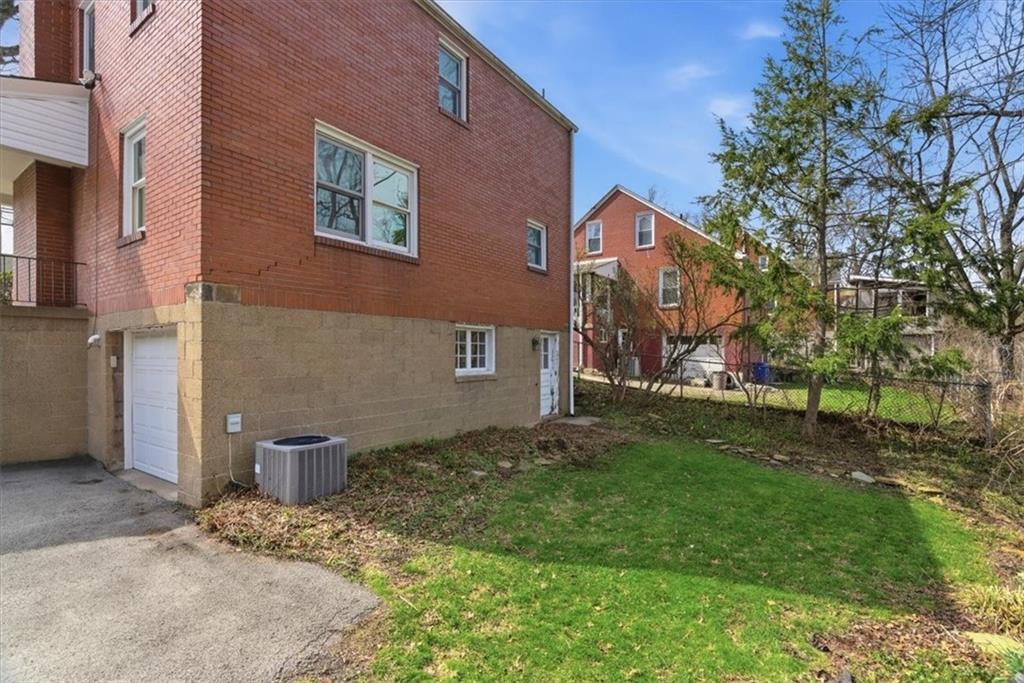 30 Warriors Road Pittsburgh, PA 15220 - Photo 22 of 30 a backyard of a house with lots of green space