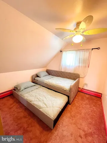 a bathroom with a sink a toilet and tub