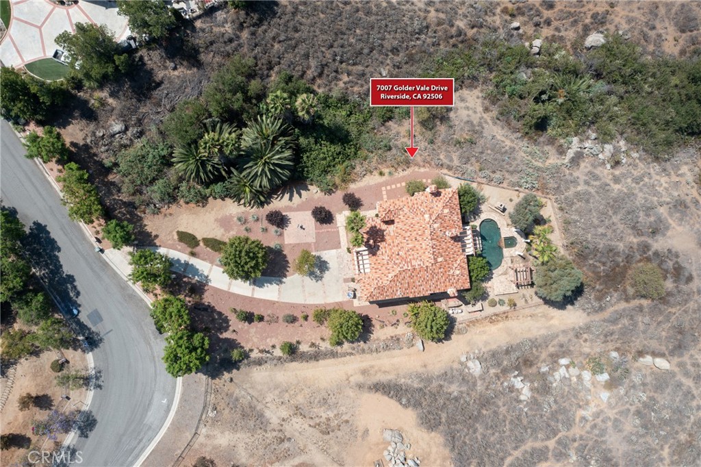 7007 Golden Vale Drive Riverside, CA 92506 - Photo 11 of 72 a sign that is sitting on a road