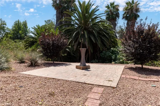 an empty room with furniture and a fireplace