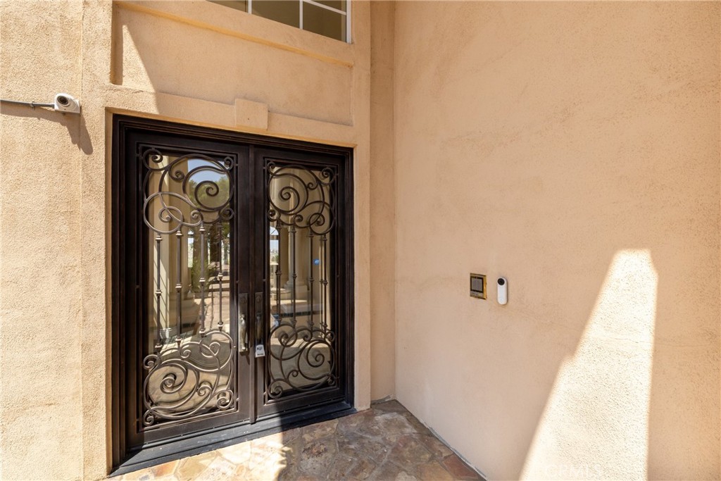 7007 Golden Vale Drive Riverside, CA 92506 - Photo 20 of 72 a view of a entryway door front of a house