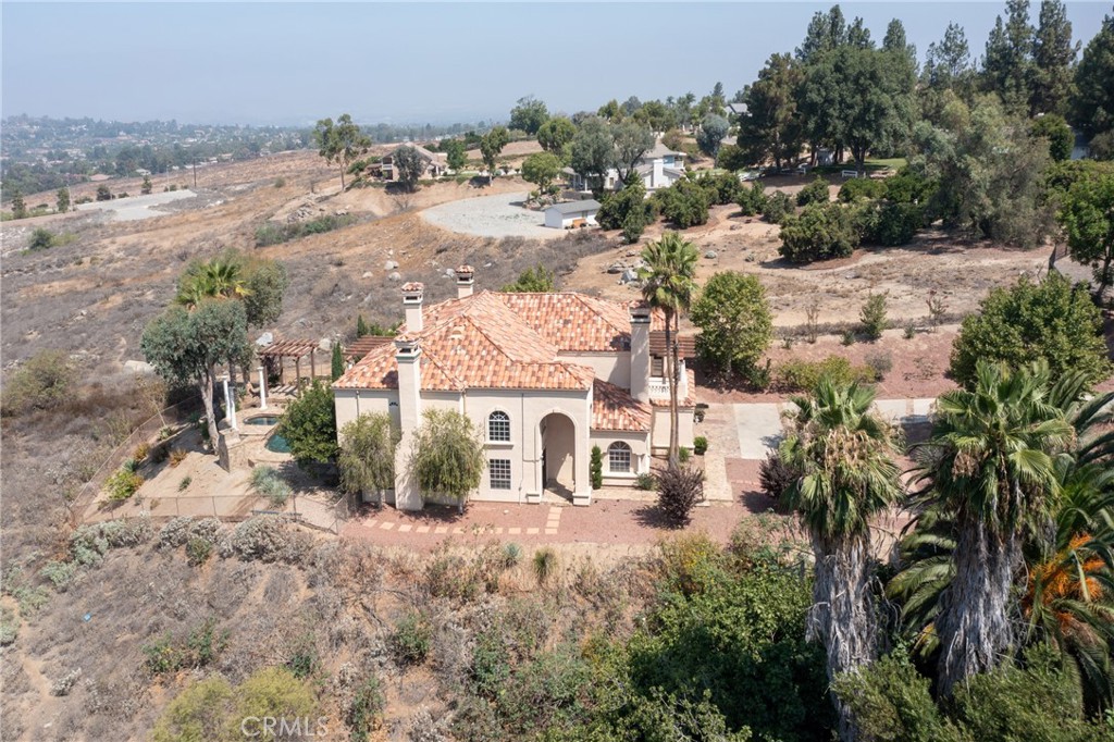 7007 Golden Vale Drive Riverside, CA 92506 - Photo 3 of 72 a view of a house with a yard