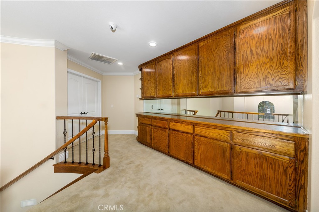 7007 Golden Vale Drive Riverside, CA 92506 - Photo 47 of 72 a kitchen with a sink and cabinets