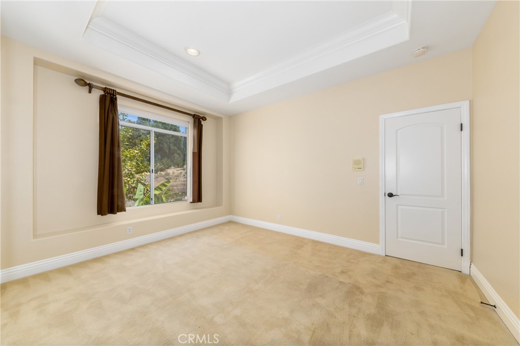 7007 Golden Vale Drive Riverside, CA 92506 - Photo 56 of 72 a view of an empty room with a window