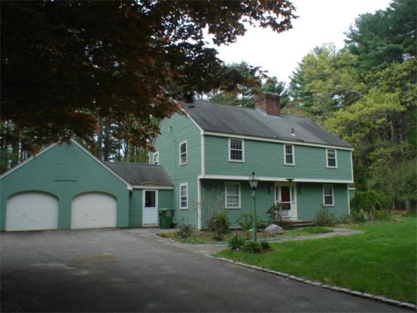 23 Sears Road Wayland, MA 01778 - Photo 5 of 6 a front view of a house with garden
