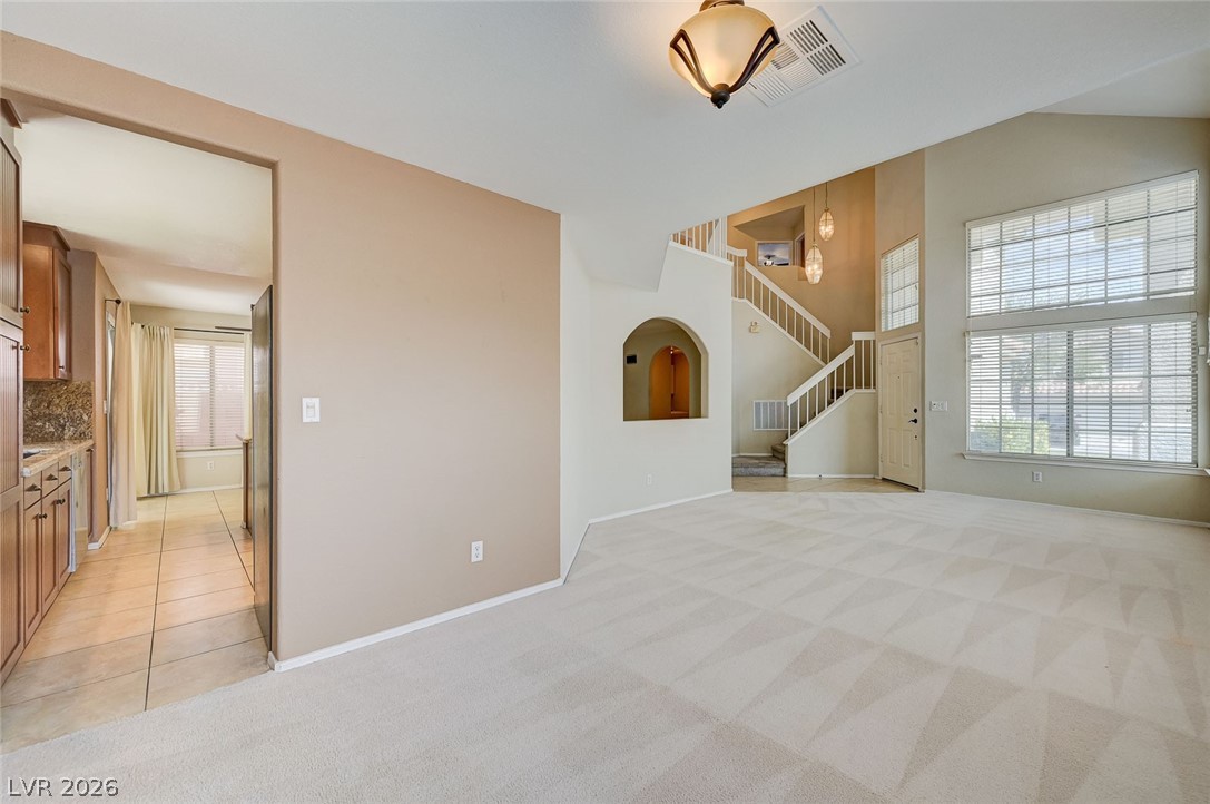 9301 Magic Flower Avenue Las Vegas, NV 89134 - Photo 13 of 70 This bright living space showcases grand windows and a flowing layout, ideal for everyday living.