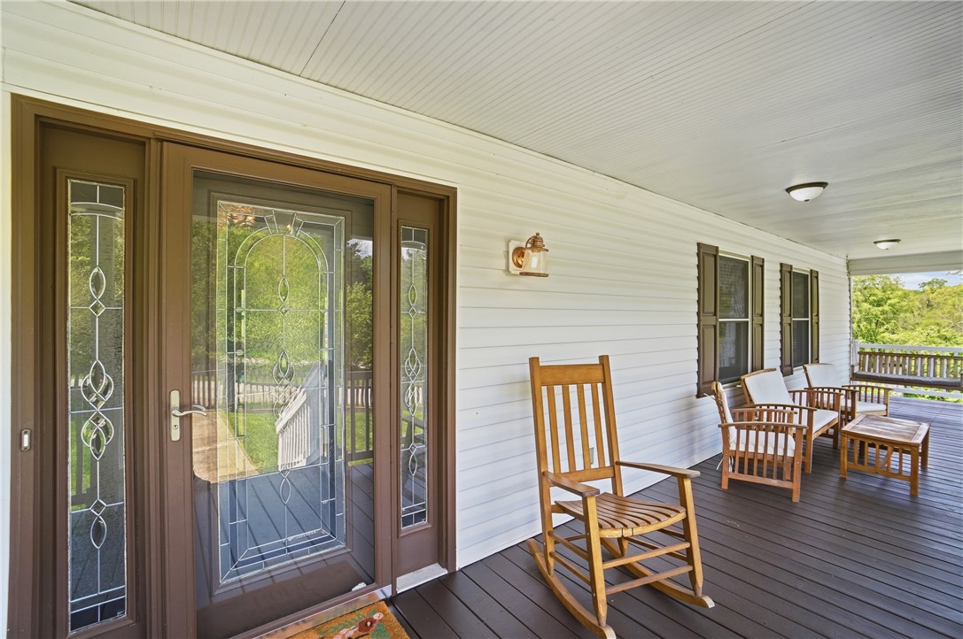 1208 Jarva Lane Springboro, OH 45066 - Photo 9 of 75 This inviting porch offers comfortable outdoor living with scenic views.