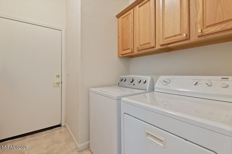 403 Sierra Leaf Circle Reno, NV 89511 - Photo 19 of 25 a utility room with dryer and washer