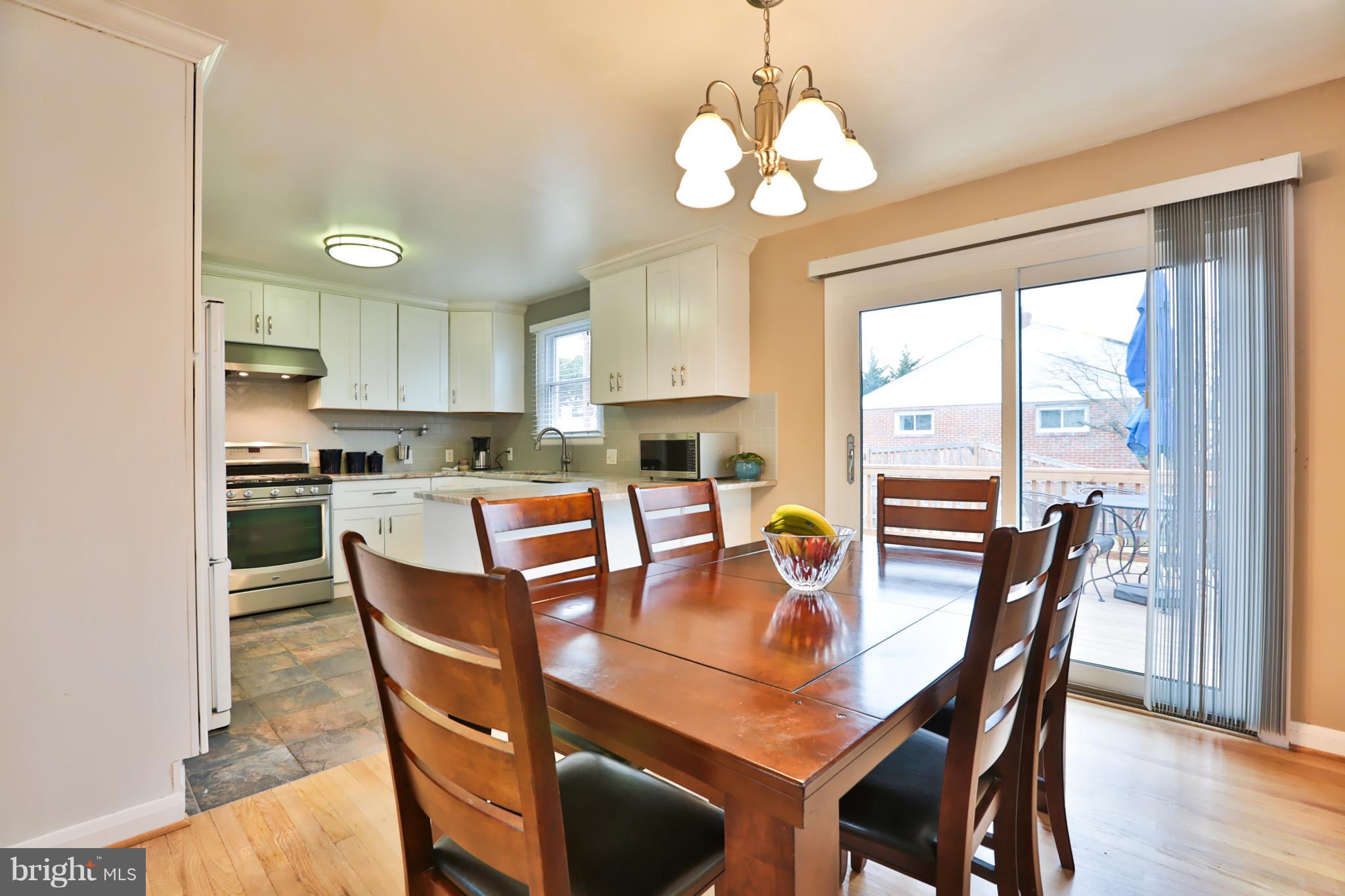 312 Orley Road Baltimore, MD 21228 - Photo 7 of 30 Dining Area with Deck Access