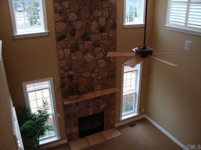 121 Barbee Road Morrisville, NC 27560 - Photo 5 of 6 an empty room with windows