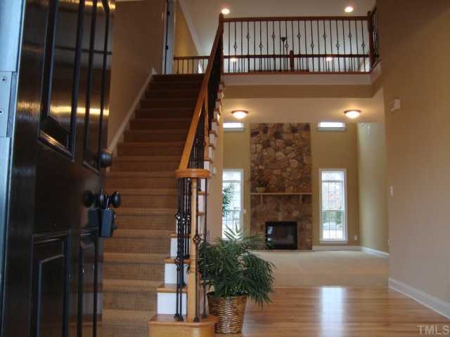 121 Barbee Road Morrisville, NC 27560 - Photo 6 of 6 a view of entryway and hall with wooden floor