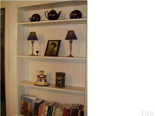 209 Bryant Road Pensacola, FL 32507 - Photo 9 of 17 built in bookcase in living room