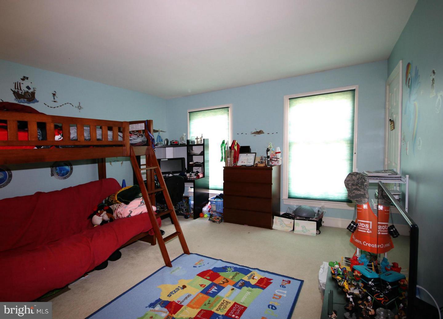 4708 Silverbrook Way Bowie, MD 20720 - Photo 15 of 21 a children room with furniture and a couch
