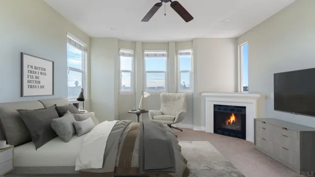 a bedroom with a bed and a fireplace