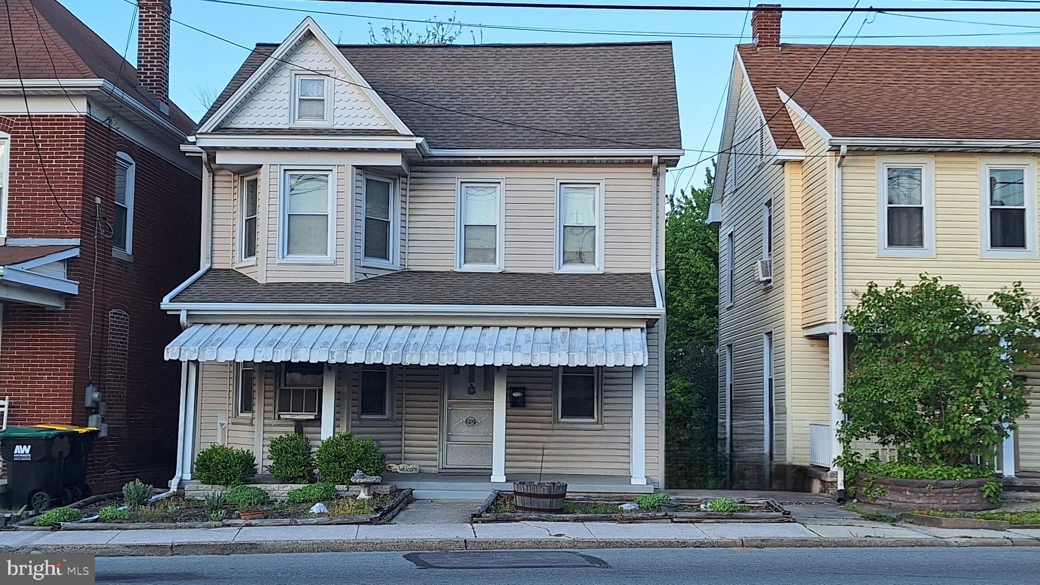 892 Baltimore Street Hanover, PA 17331 - Photo 2 of 6 a front view of a house with a yard