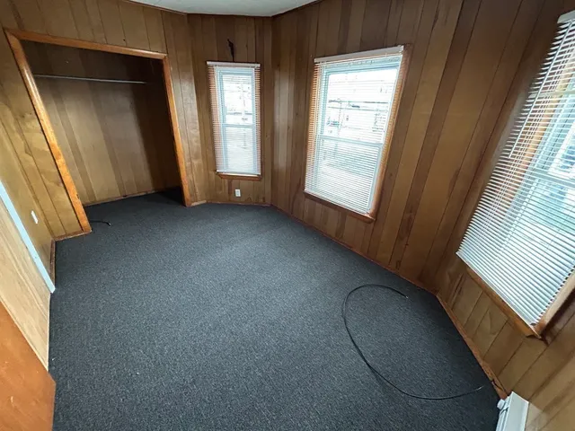 a view of a room with windows