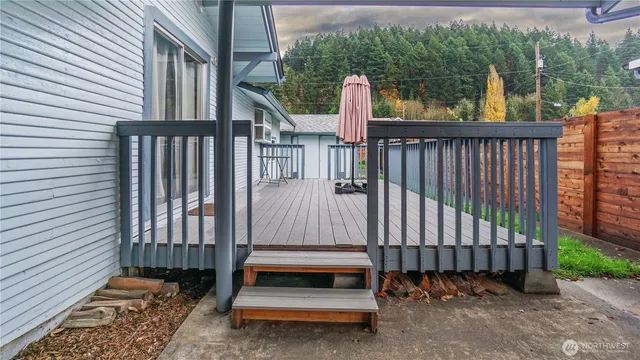 a view of outdoor space with deck and a garden