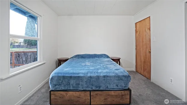 a room with a bed and a closet