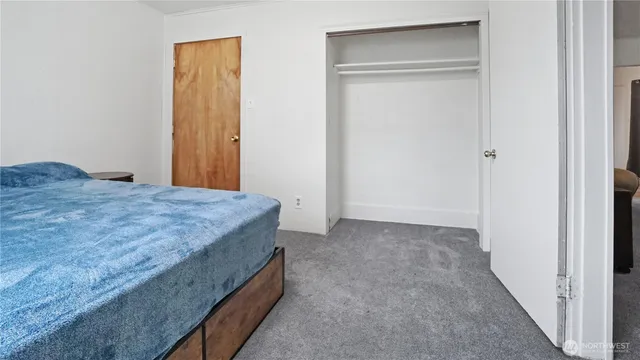 a bathroom with a sink a mirror and a shower