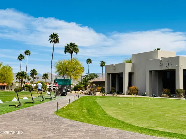 a outdoor dining space with furniture and outdoor view