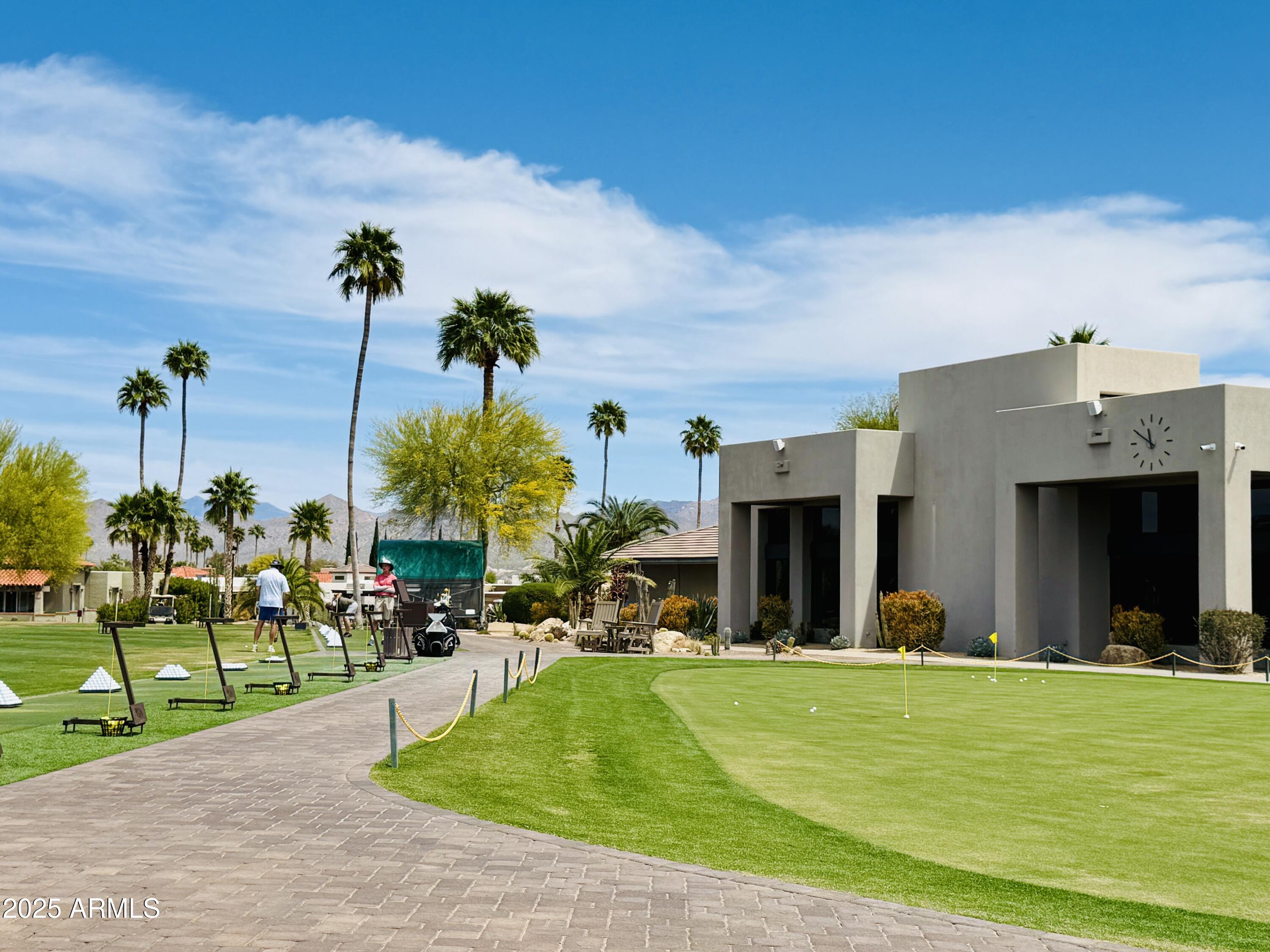 25615 North Bolero Bend, Unit 5 Rio Verde, AZ 85263 - Photo 24 of 65 a view of a building and front view of a lake