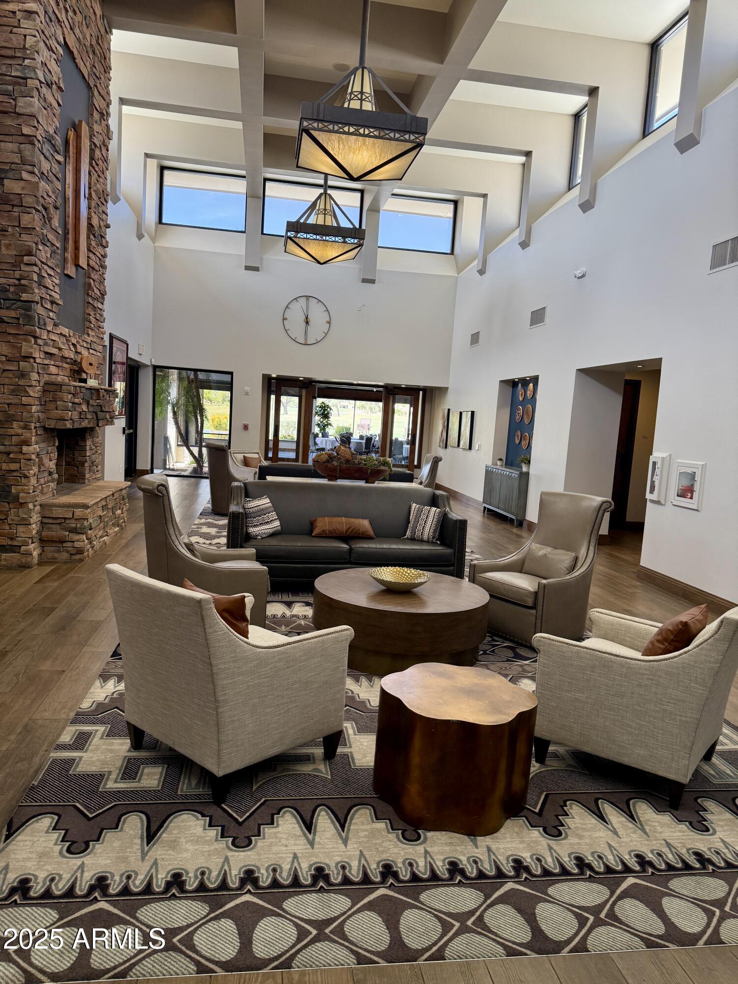 25615 North Bolero Bend, Unit 5 Rio Verde, AZ 85263 - Photo 26 of 65 a living room with furniture and a large window