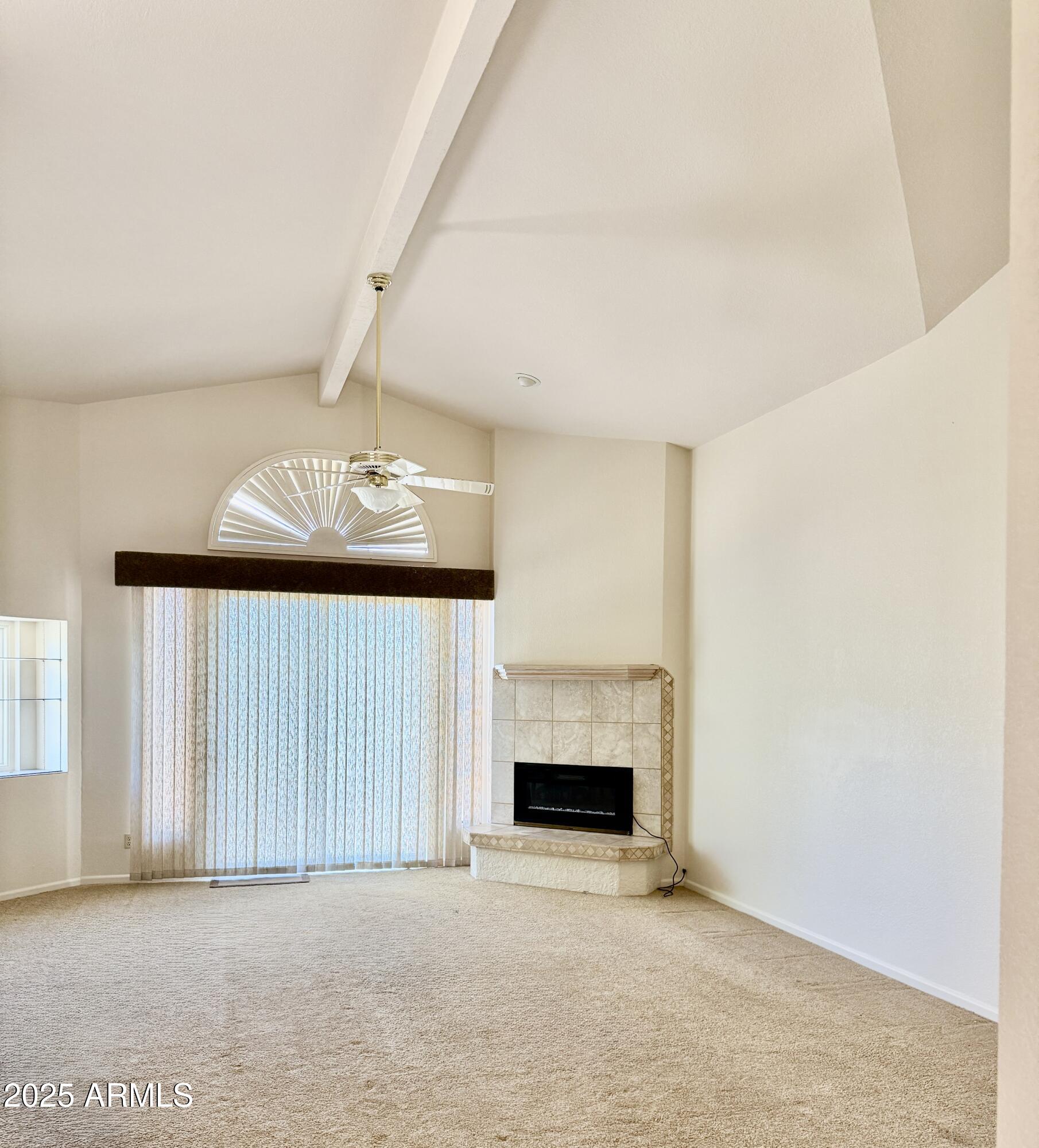 25615 North Bolero Bend, Unit 5 Rio Verde, AZ 85263 - Photo 3 of 65 an empty room with a fireplace