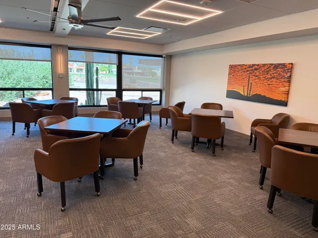 a view of a tennis court with lots of swings and slides