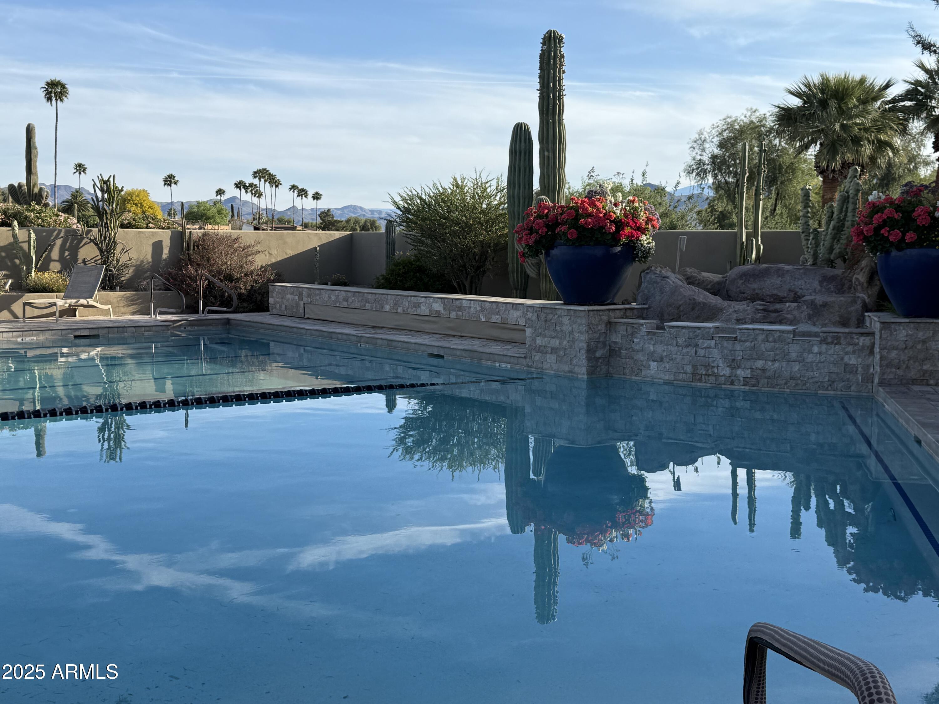 25615 North Bolero Bend, Unit 5 Rio Verde, AZ 85263 - Photo 55 of 65 a view of a lake and a yard