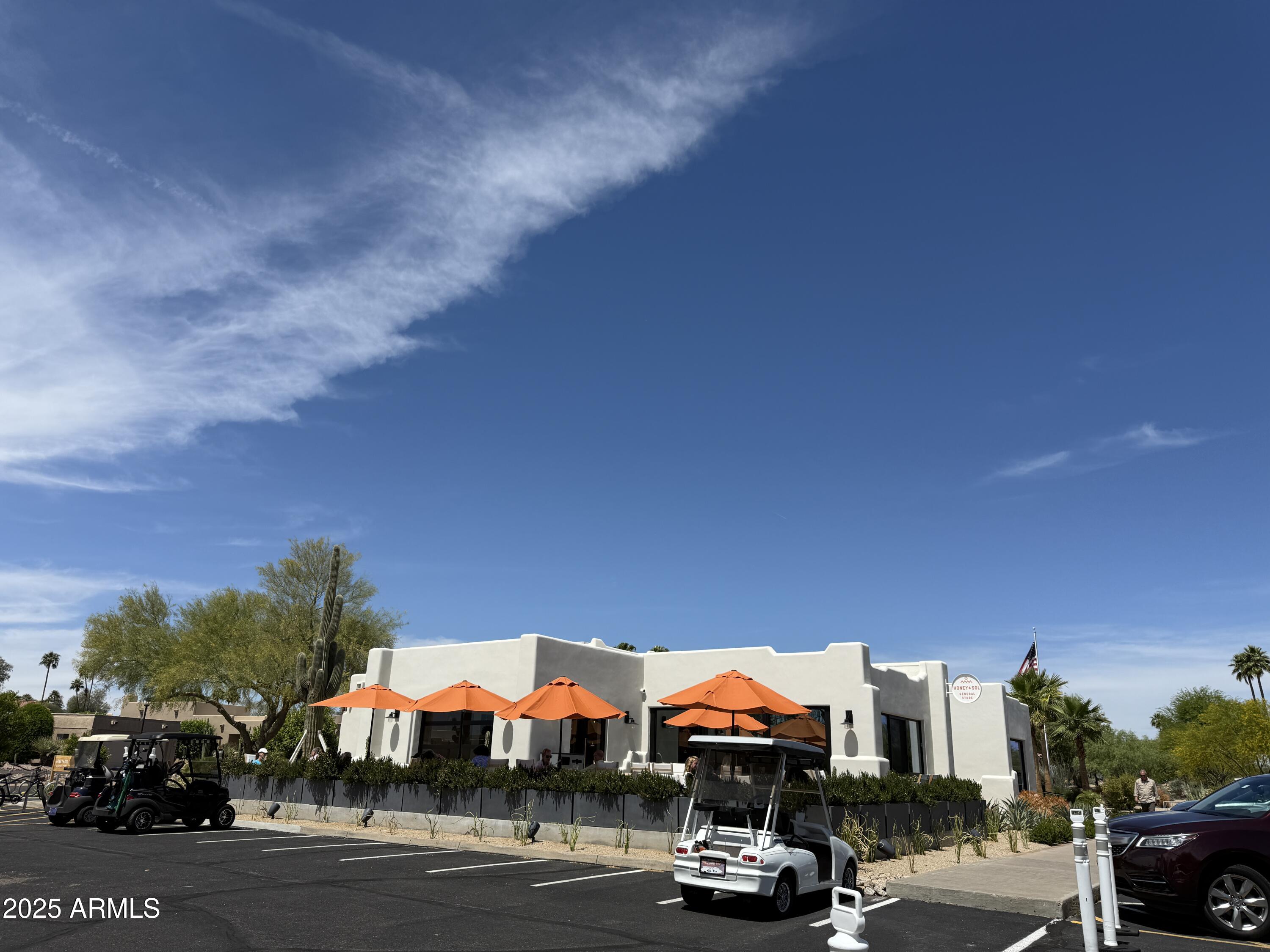 25615 North Bolero Bend, Unit 5 Rio Verde, AZ 85263 - Photo 61 of 65 a view of building with cars parked
