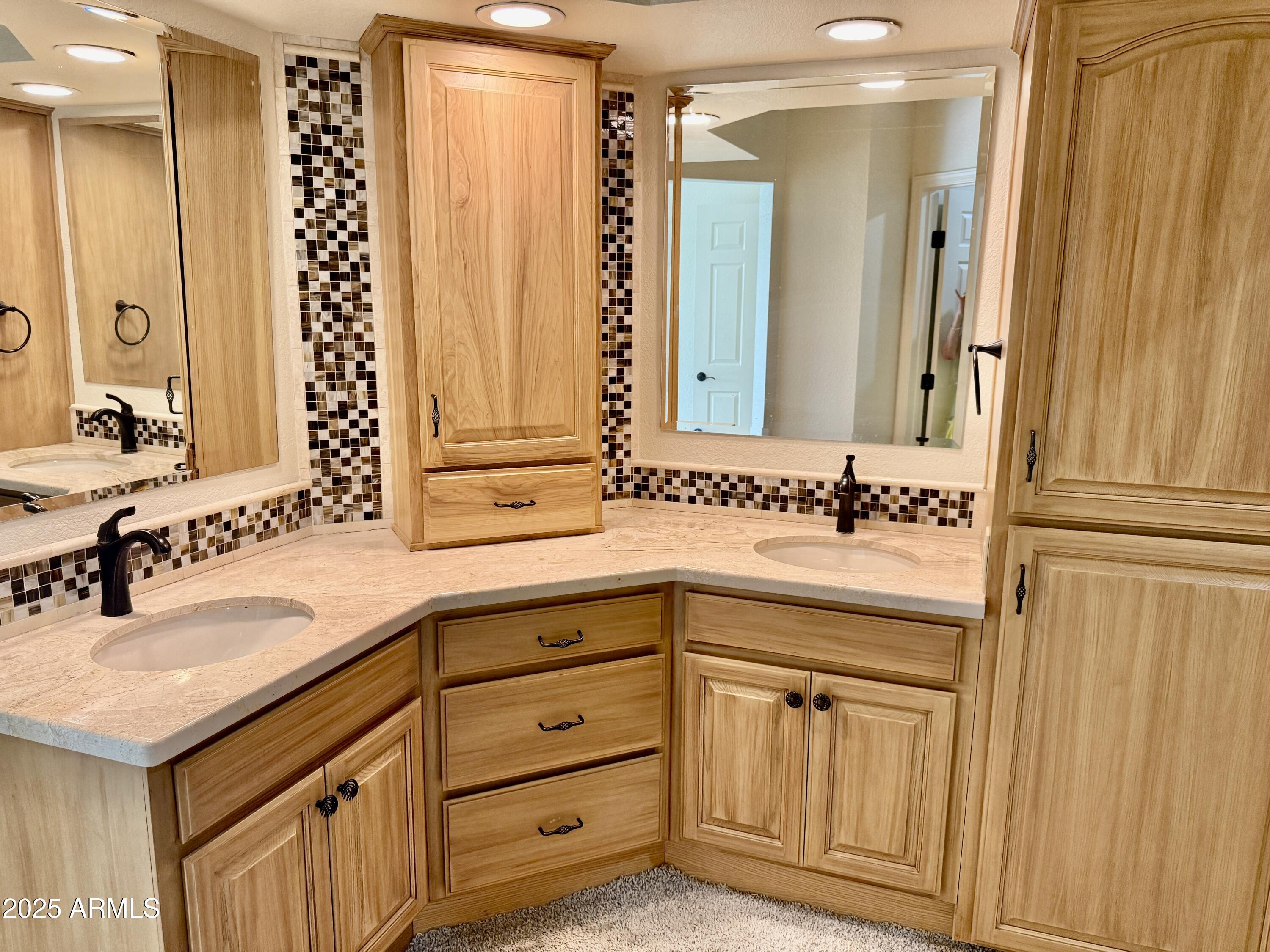 25615 North Bolero Bend, Unit 5 Rio Verde, AZ 85263 - Photo 8 of 65 a bathroom with a sink double vanity and a mirror