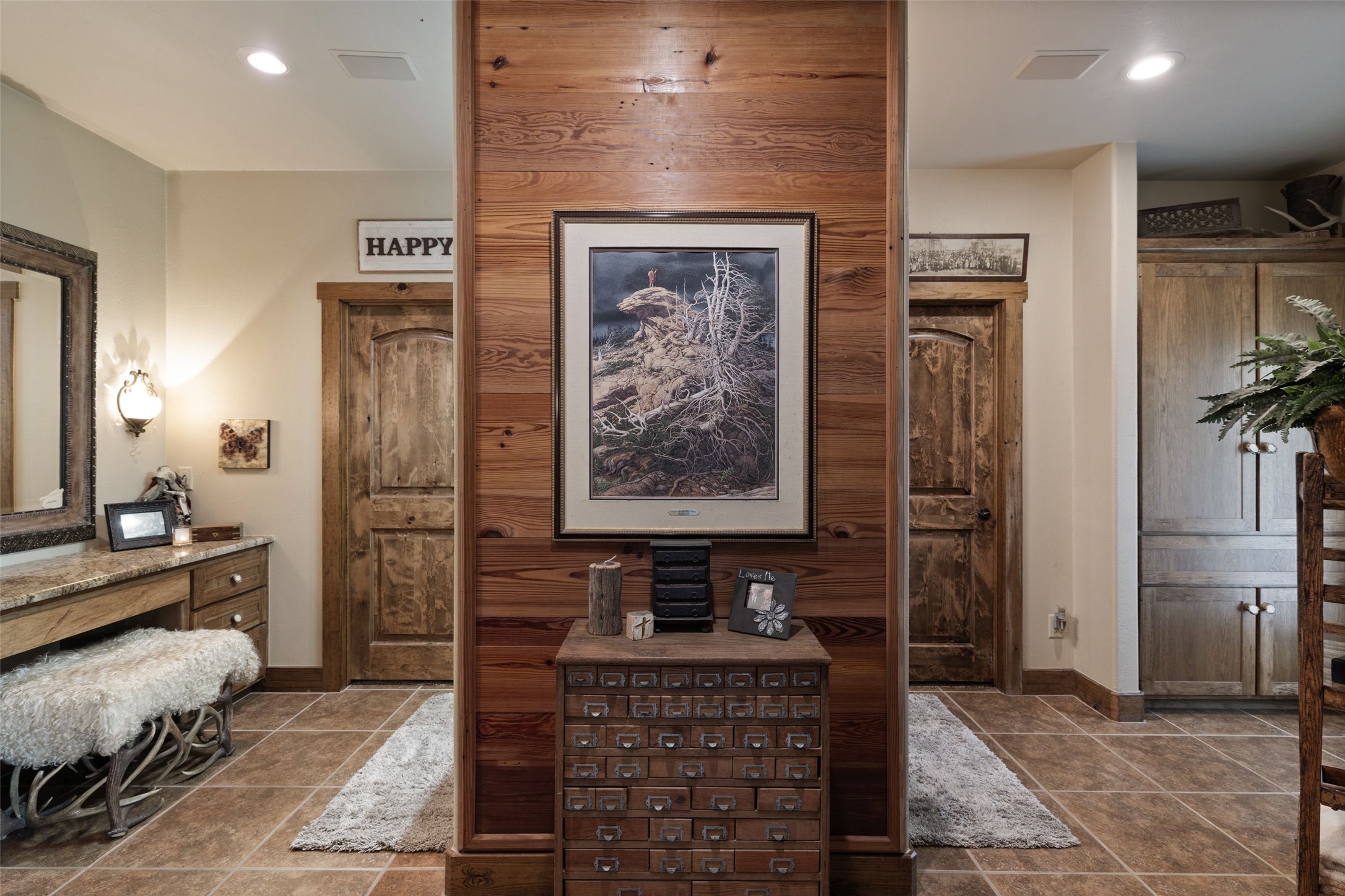 8400 Ranch Road 1431 Marble Falls, TX 78654 - Photo 16 of 30 Rich wood paneling and earthy tones create a warm, inviting entrance to this unique space.