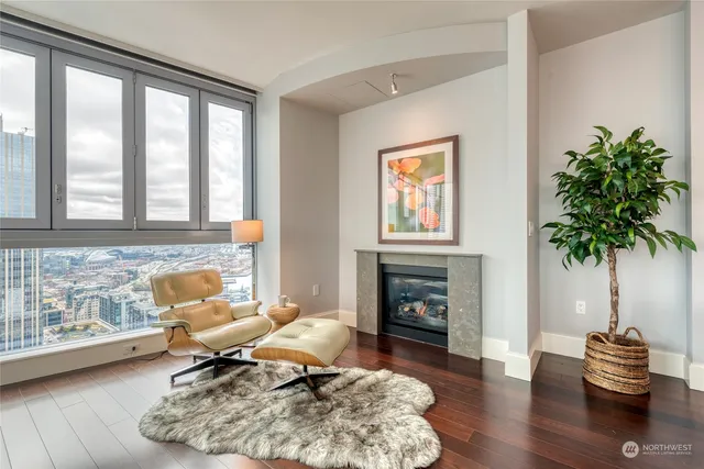 a kitchen with a stove cabinets and wooden floor